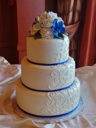 white-on-white-scrolls-and-royal-blue-ribbon-large